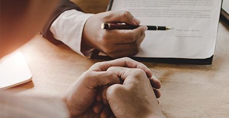 person about to sign a document